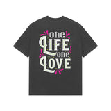 Black Kayzen One Life One Love Oversized
Heavyweight T-Shirt - pink green white ornate
decorative lettering motivational quote graphic back
print on dark contrast base | Buy premium oversized
graphic tee India